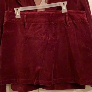 Deep burgundy suit smooth velvety feel.